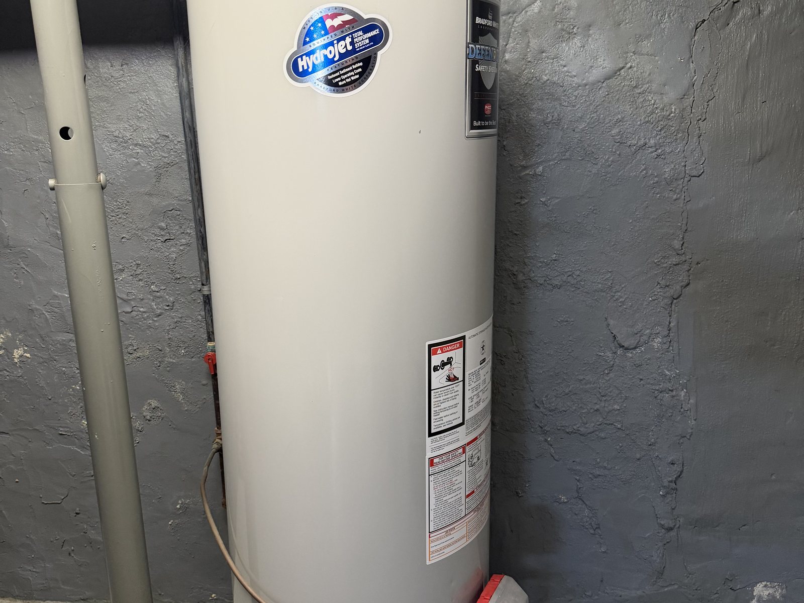 New Bradford White water heater in a basement